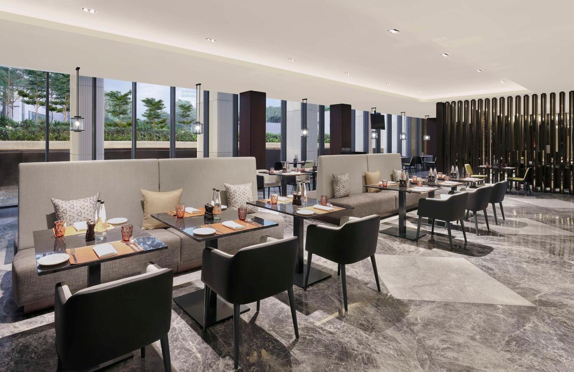 Hotel Hilton Bengaluru Embassy Manyata Business Park Extérieur photo